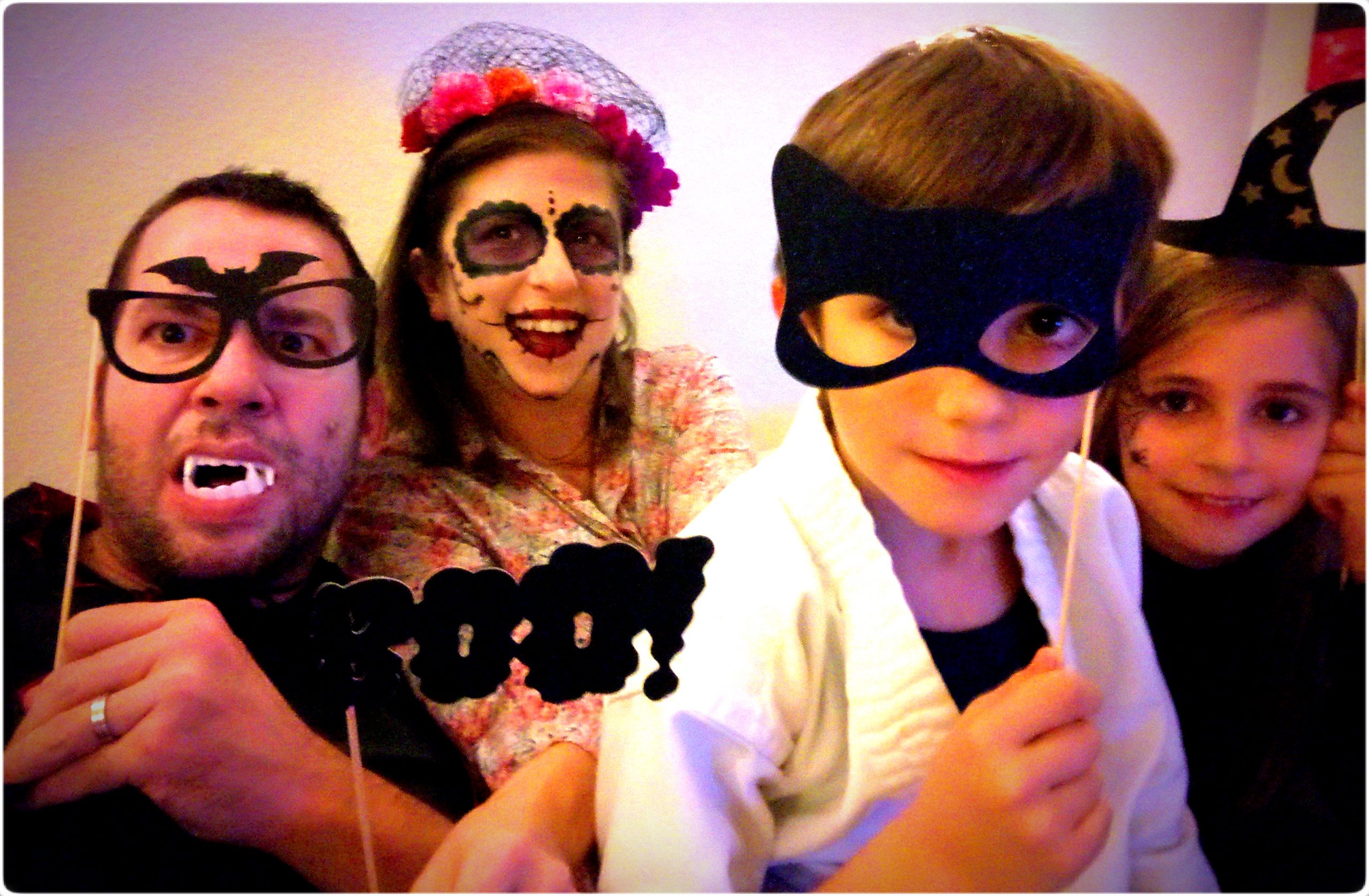 family Halloween costume, a vampire, a bat Karate Kid, a which and a Boo!